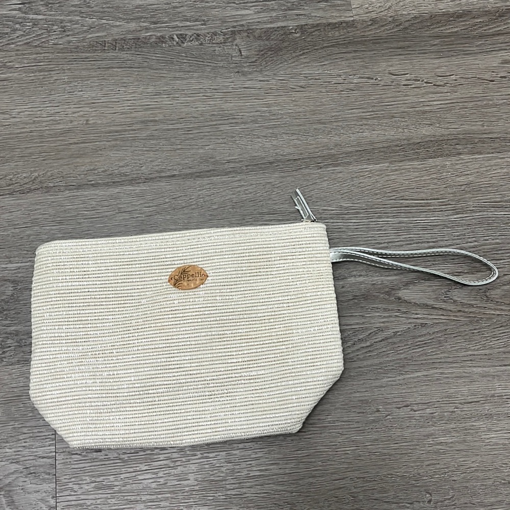 Cappelli Straworld Inc Wristlet Straw Bag- tan and silver